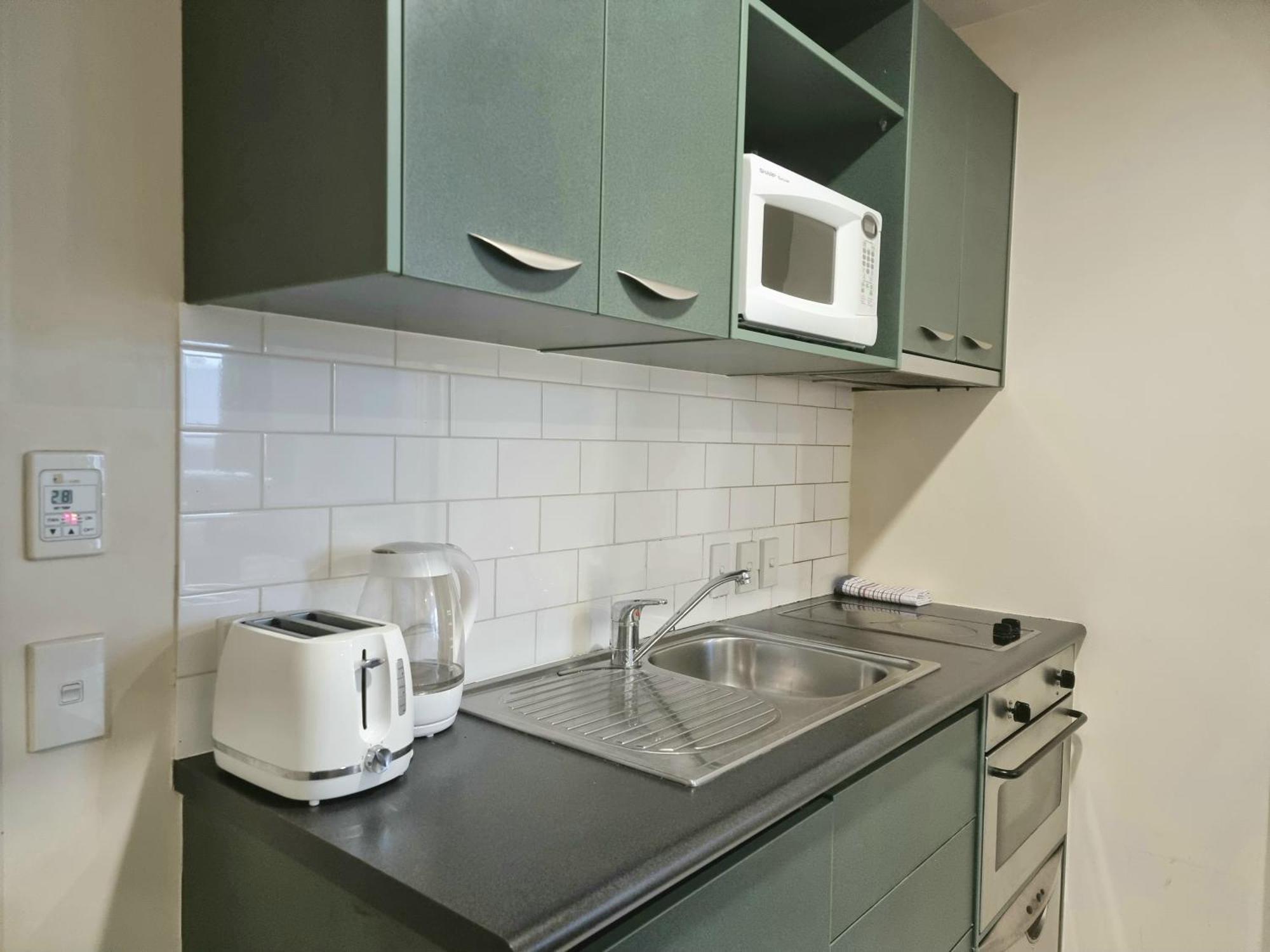 Urban Deco Apartment On Queen Street Auckland Værelse billede